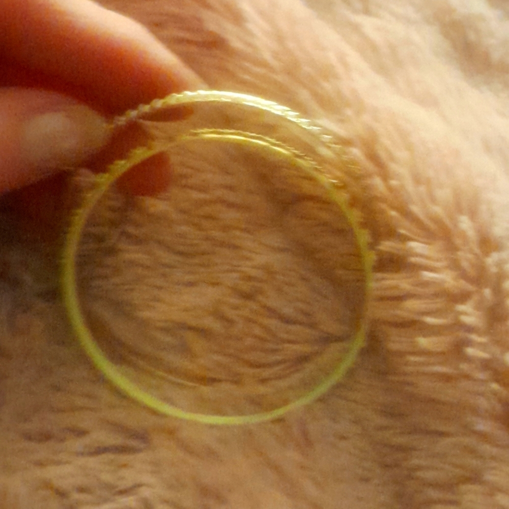 2 gold bracelets